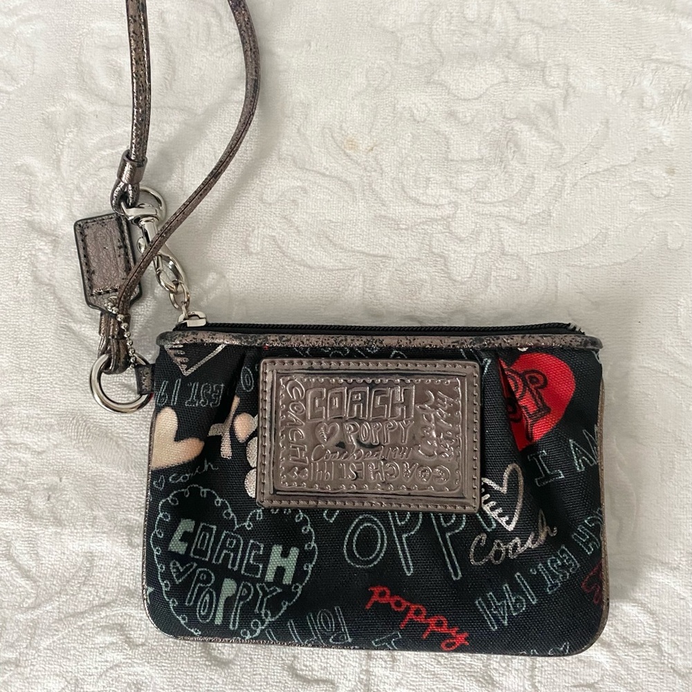 Coach Poppy graffiti wristlet